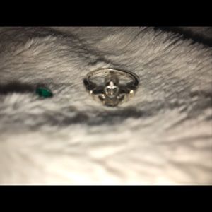 Stamped 925 sterling silver Claddagh Ring, heart shaped emerald cut stone